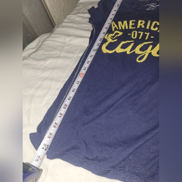 American eagle T-shirt size xs in navy blue with yellow lettering. - Picture 5 of 8